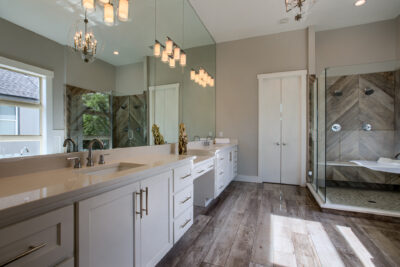 Cheyenne - Primary Bathroom with white painted cabinets