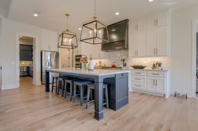 Santa Fe - Kitchen with white enamel cabinets and dark grey island